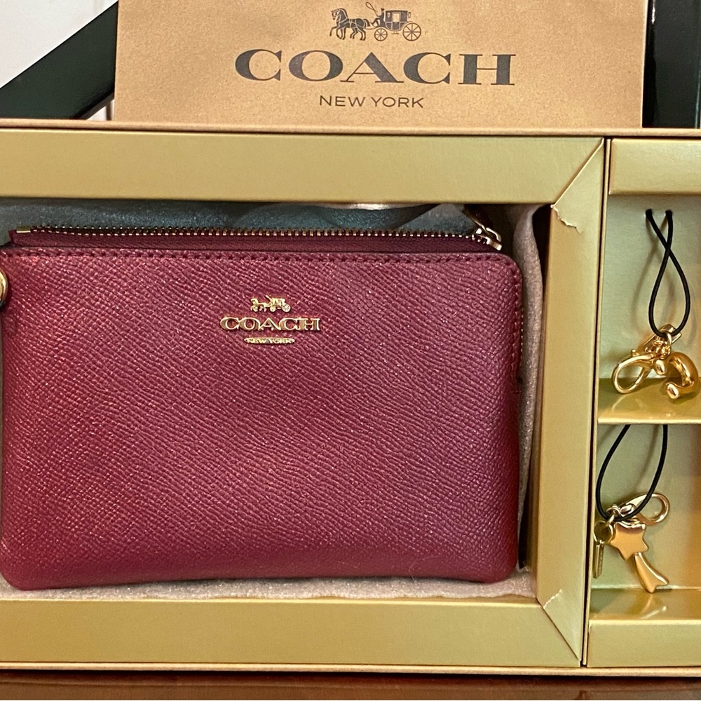 Coach Women's Burgundy Wristlet with Gold Accents